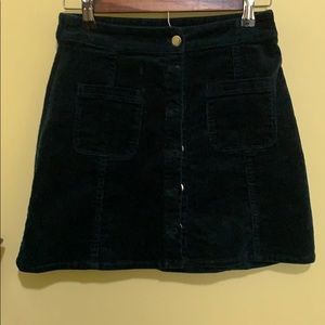 Dark green button up skirt.